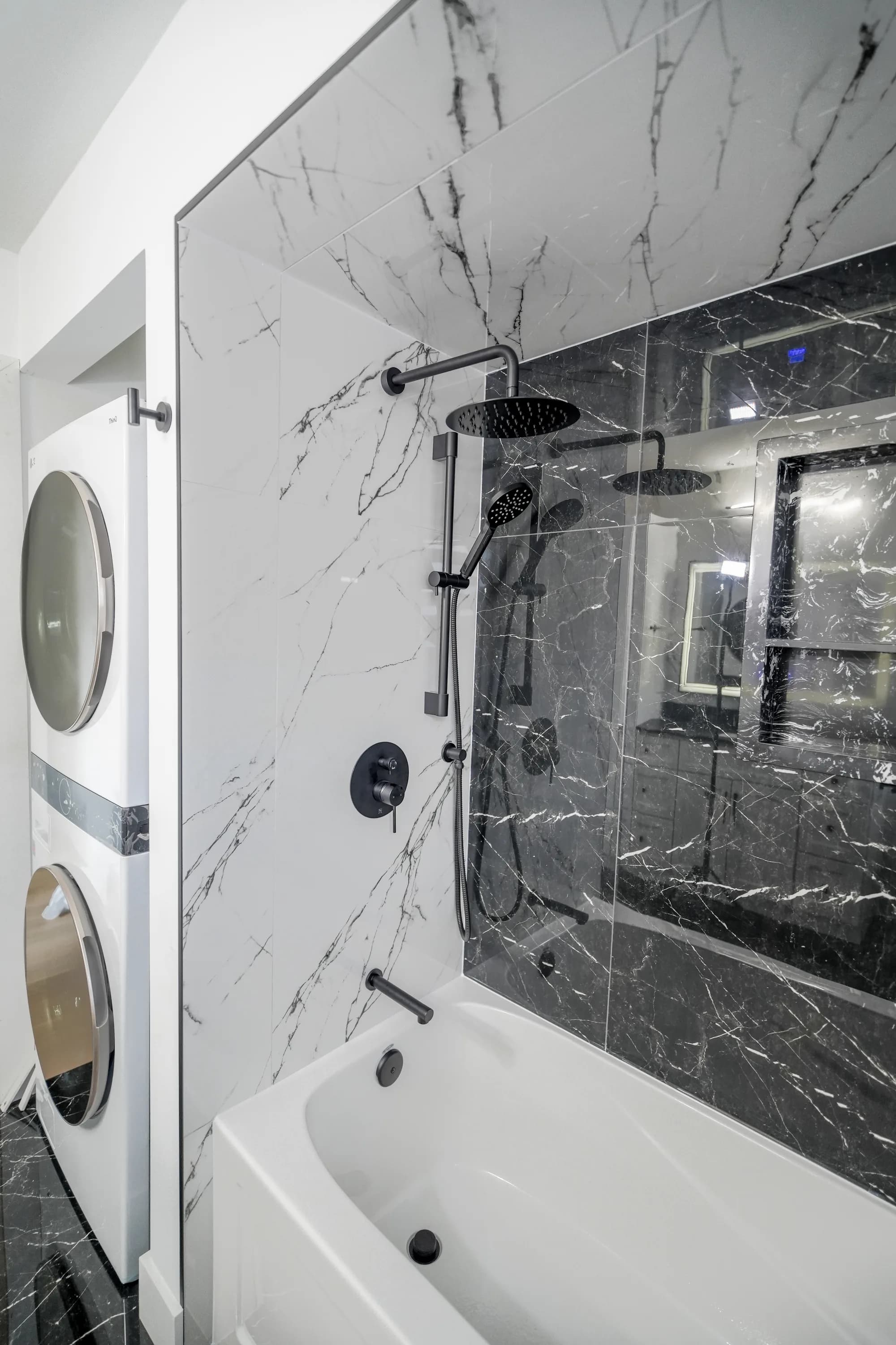 Bathroom with stacked laundry — example of tight-space planning