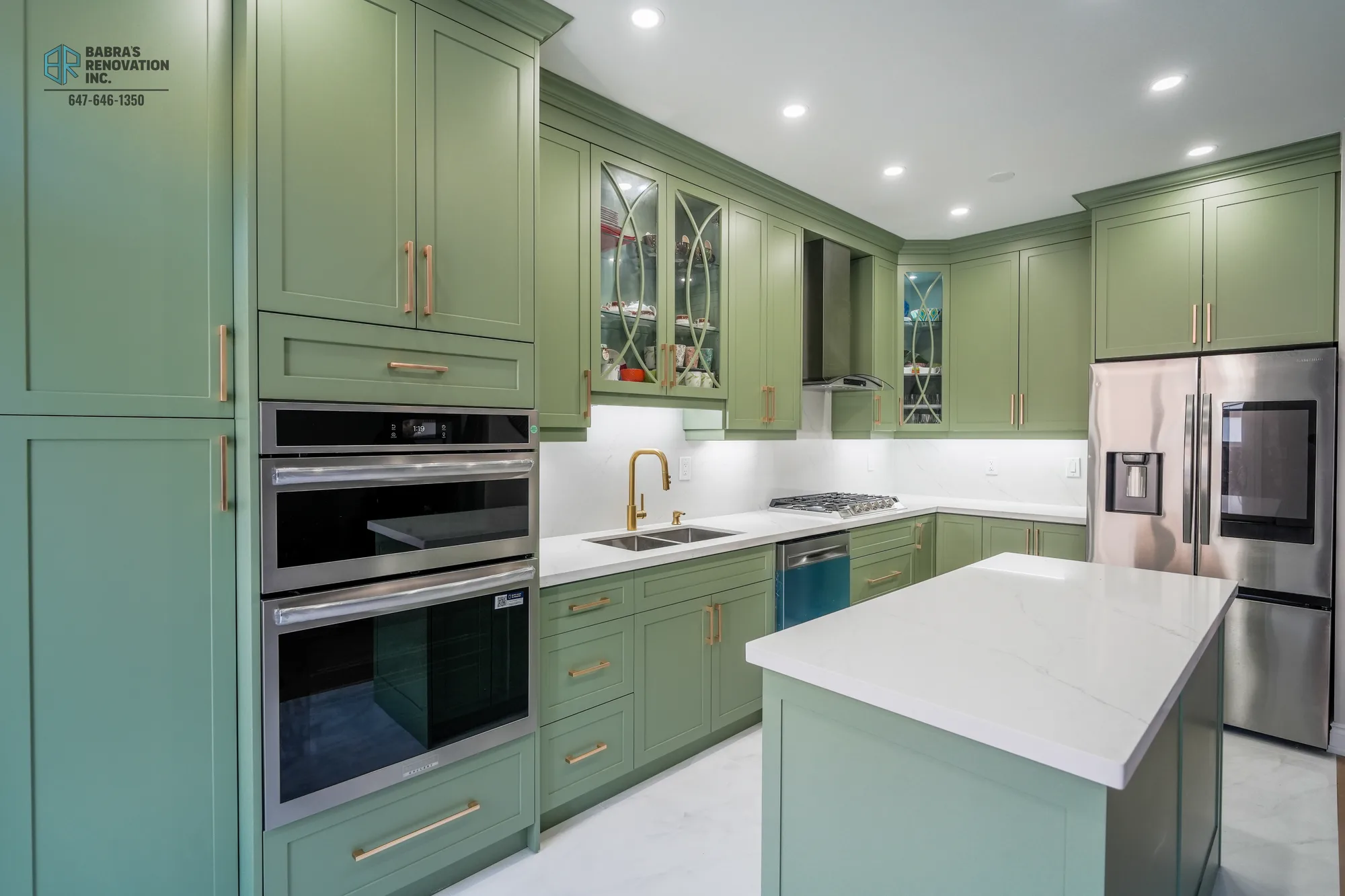 Full kitchen remodel with sage cabinets, island, and stainless appliances