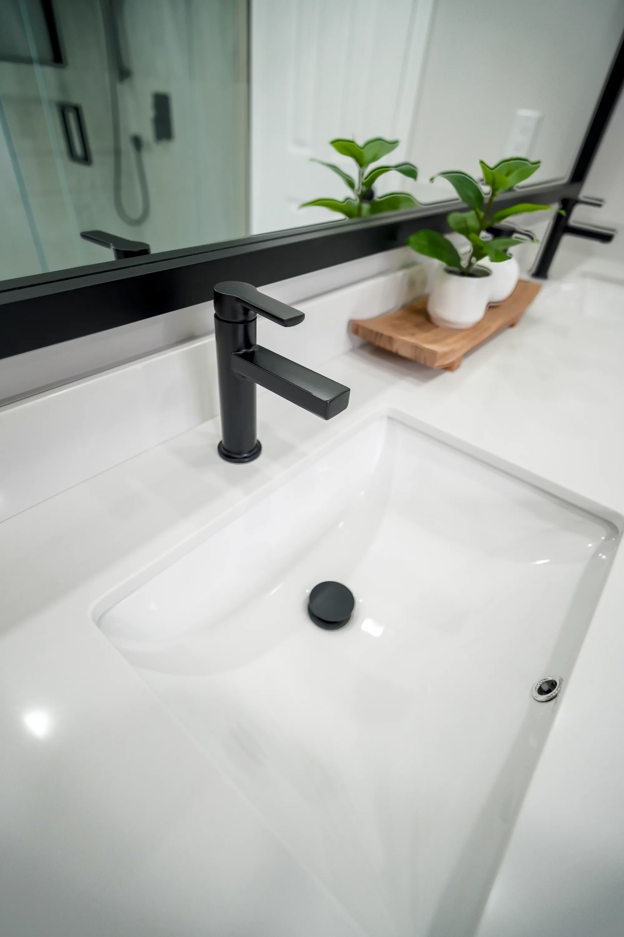 Modern sink and faucet detail in a renovated bath