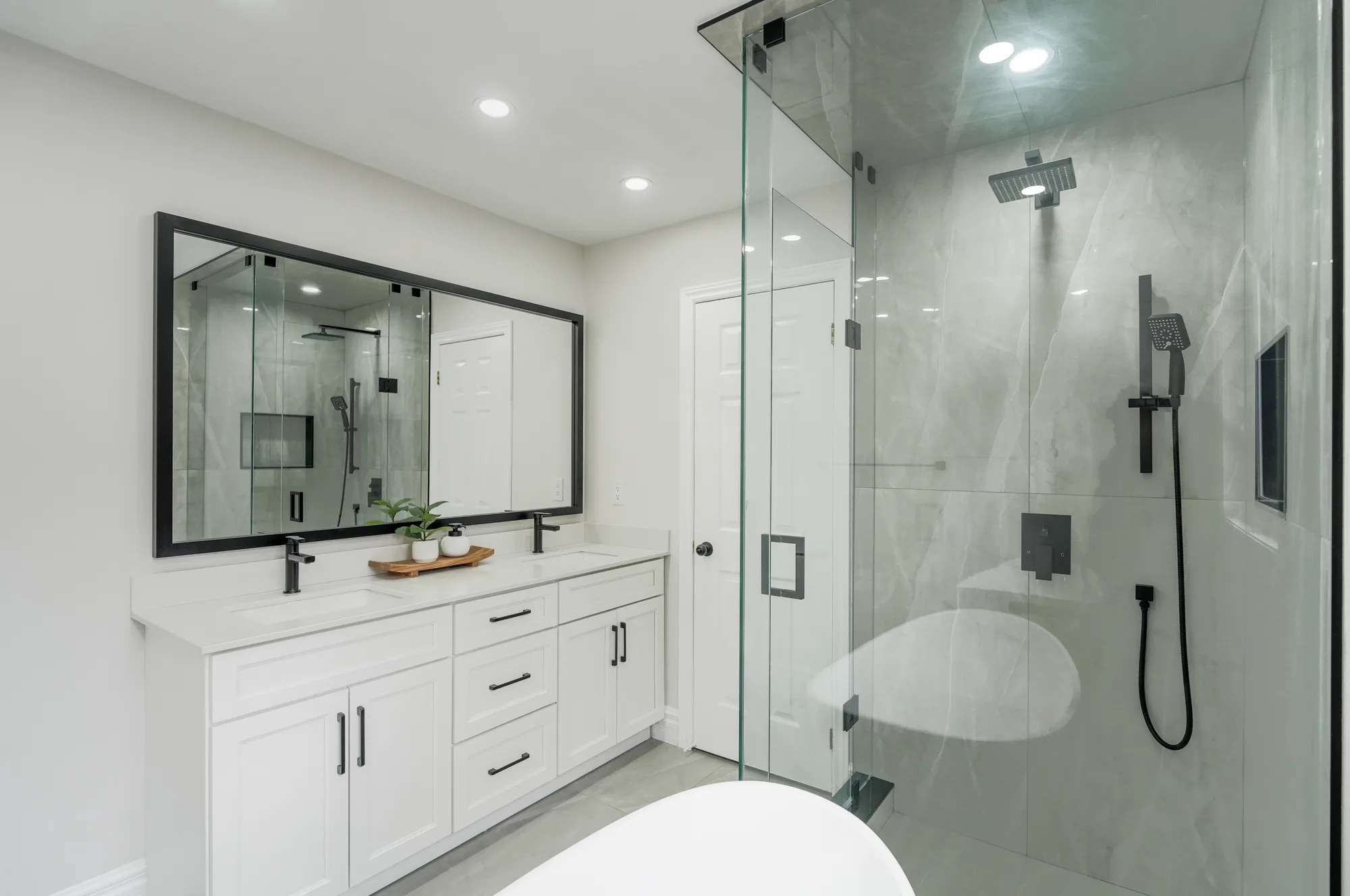 Double vanity bathroom with walk-in shower